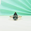 Pear Shape Teal Sapphire Trilogy Ring